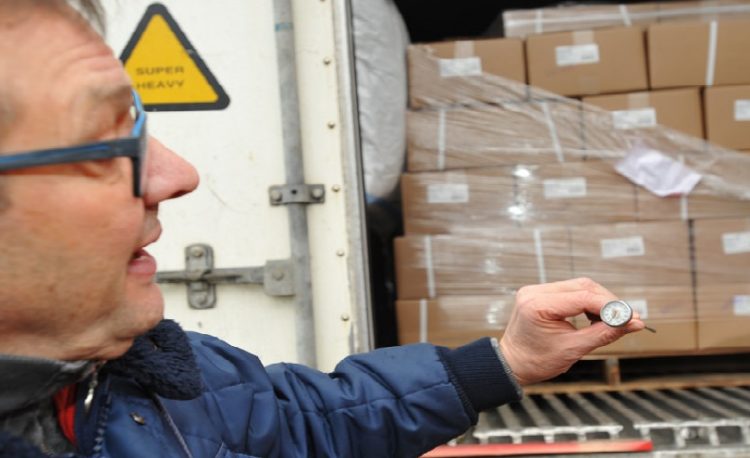 Man checking the cold storage