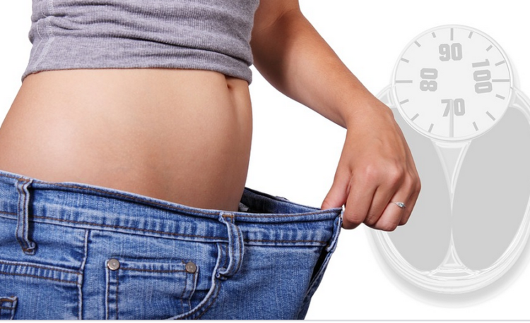 a man showing lost weight